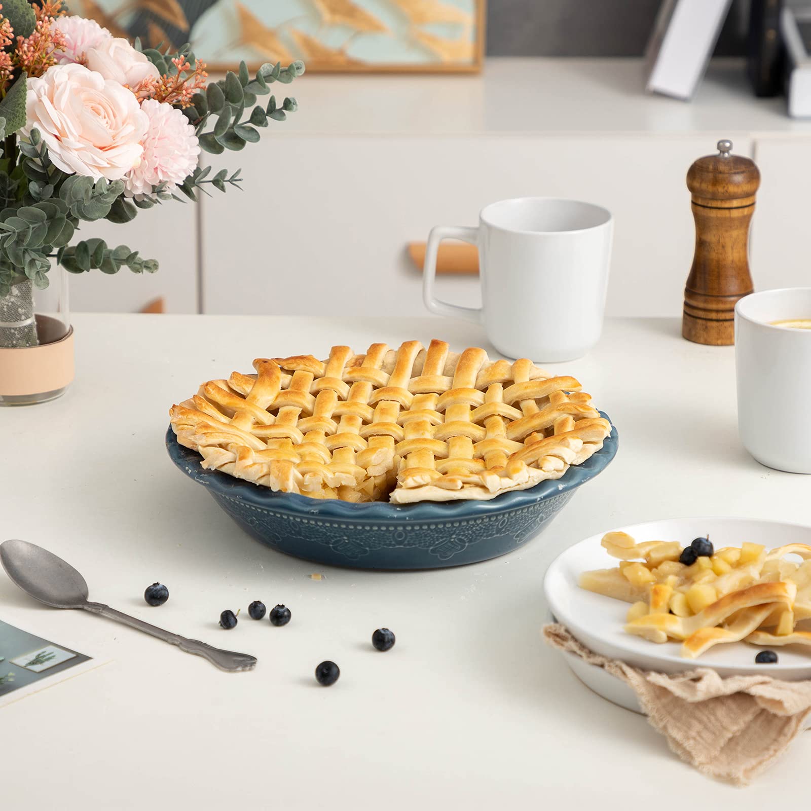 FUN ELEMENTS pie pan beside standard plate for scale demonstrating generous 10.5 inch diameter