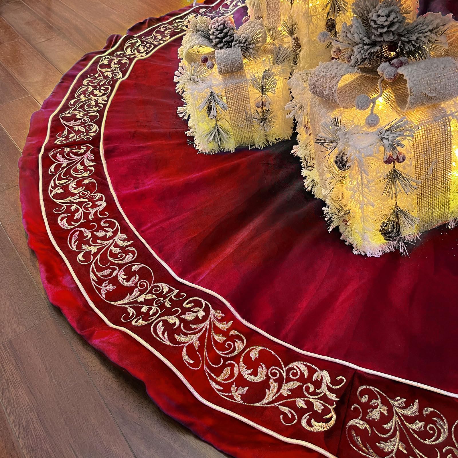 FunAcce red tree skirt under decorated Christmas tree, adds elegant base