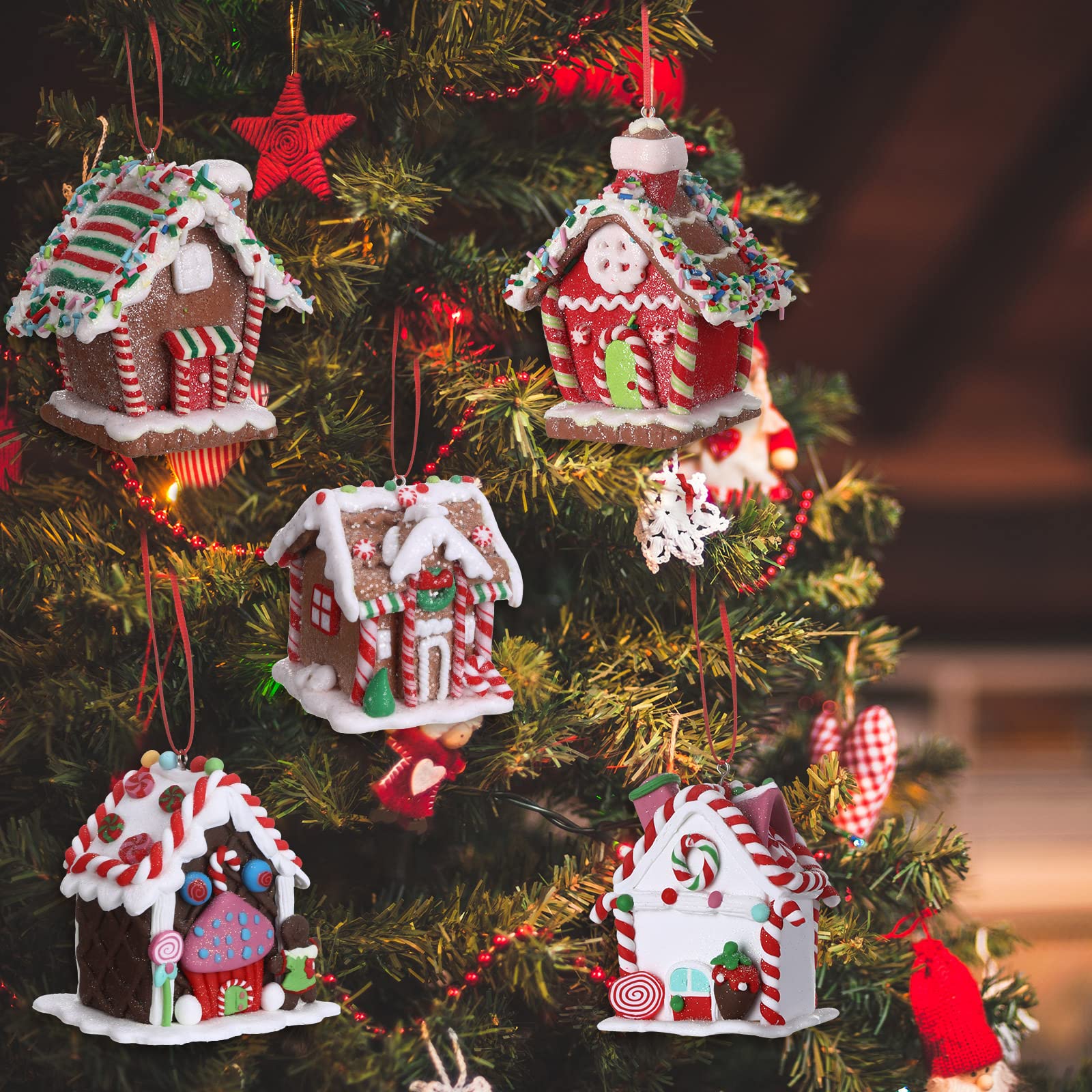 Funtery group of six gingerbread houses arranged on mantel creating cozy atmosphere