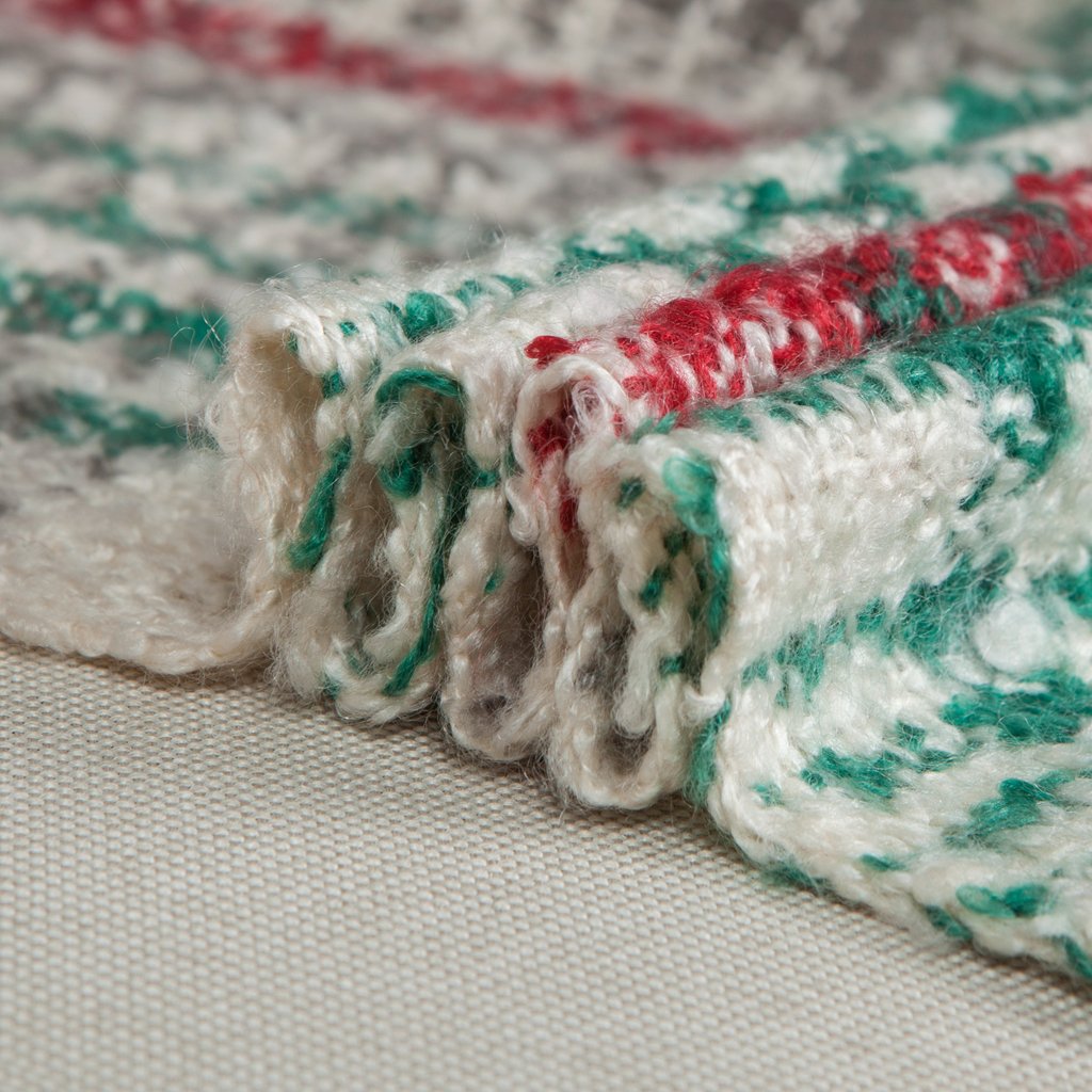 G Lake throw draped over sofa showing cozy holiday room styling benefit