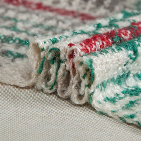 G Lake throw draped over sofa showing cozy holiday room styling benefit