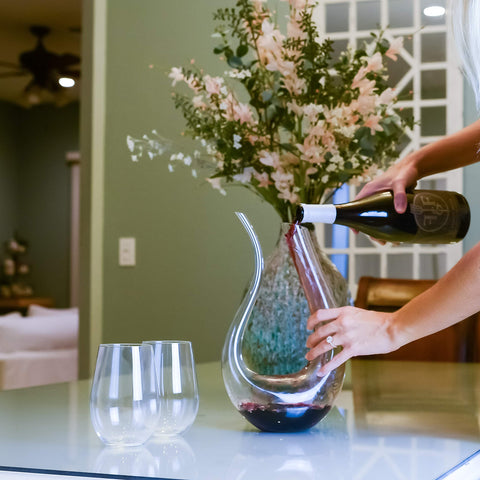 Galashield decanter beside a 750ml bottle showing scale and capacity benefit