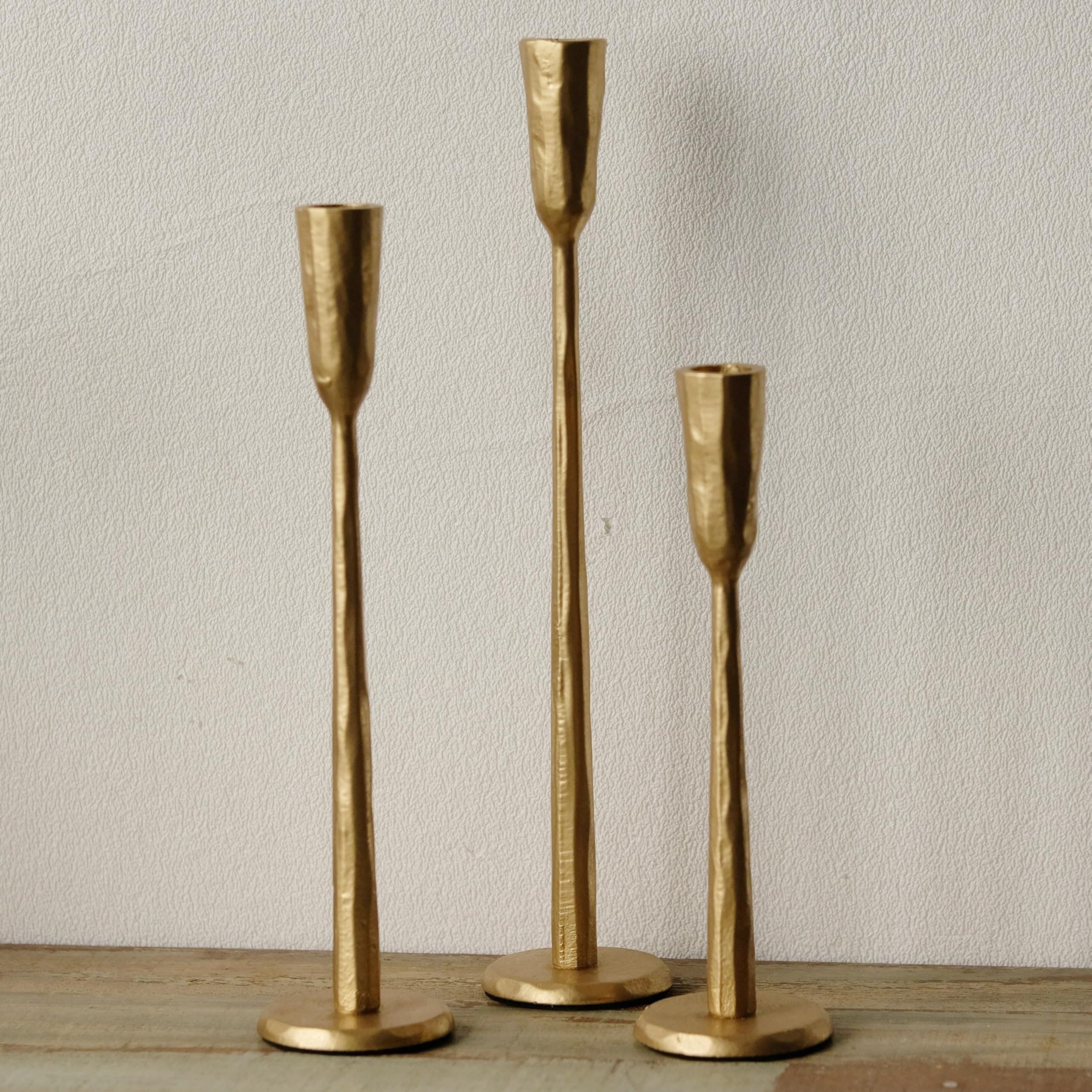 Ganwu front view of set of three candlesticks shows elegant vintage styling and balance