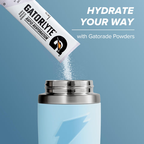 Gatorade Overtime held in hand to show 32oz size and easy portability benefit