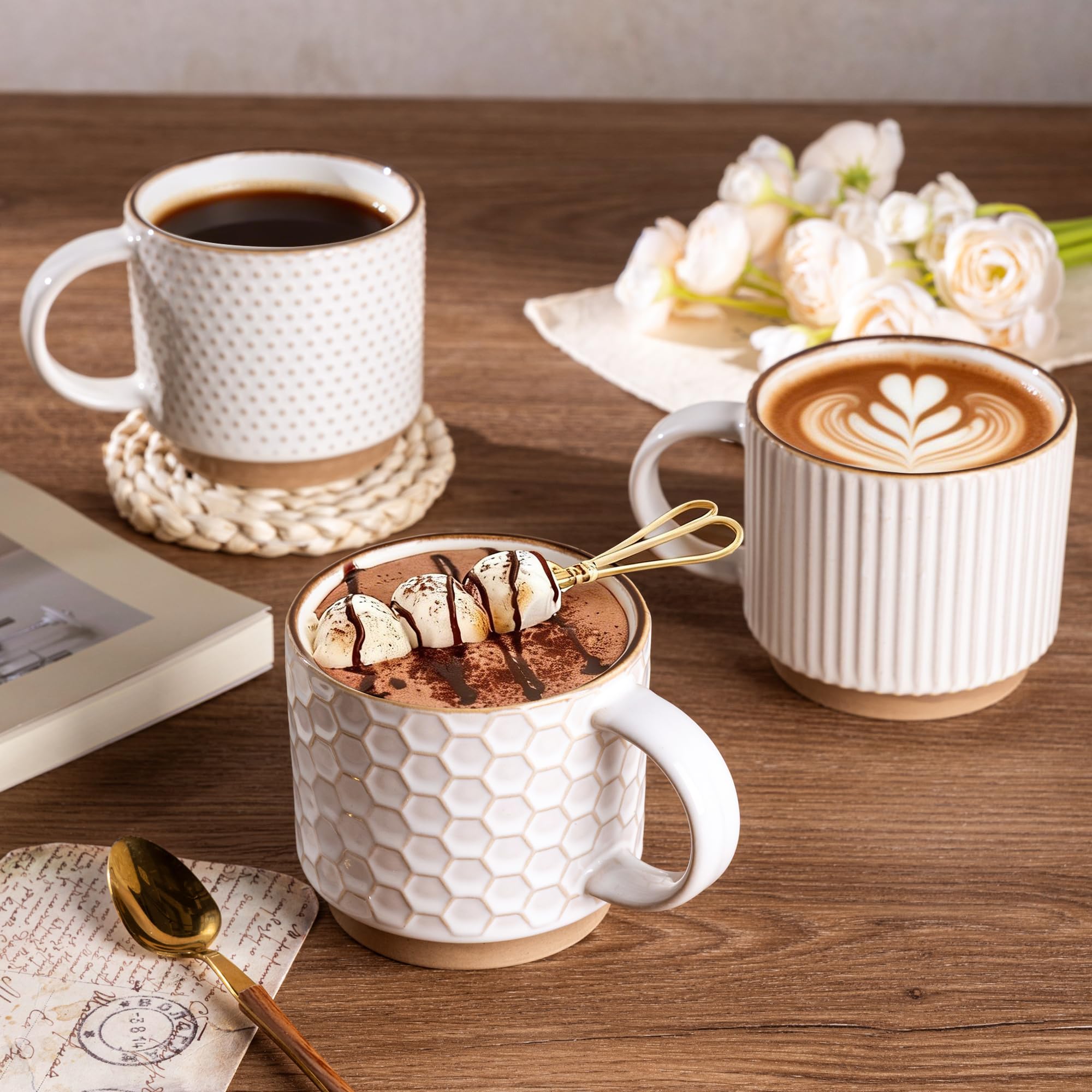 GBhome hand holding a mug to show size and comfortable rim for easy sipping benefit