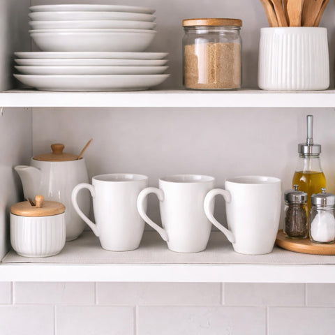 GBhome mugs stacked in cupboard showing space-saving storage