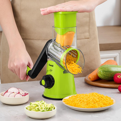 Geedel grater next to a hand to show compact size and easy storage