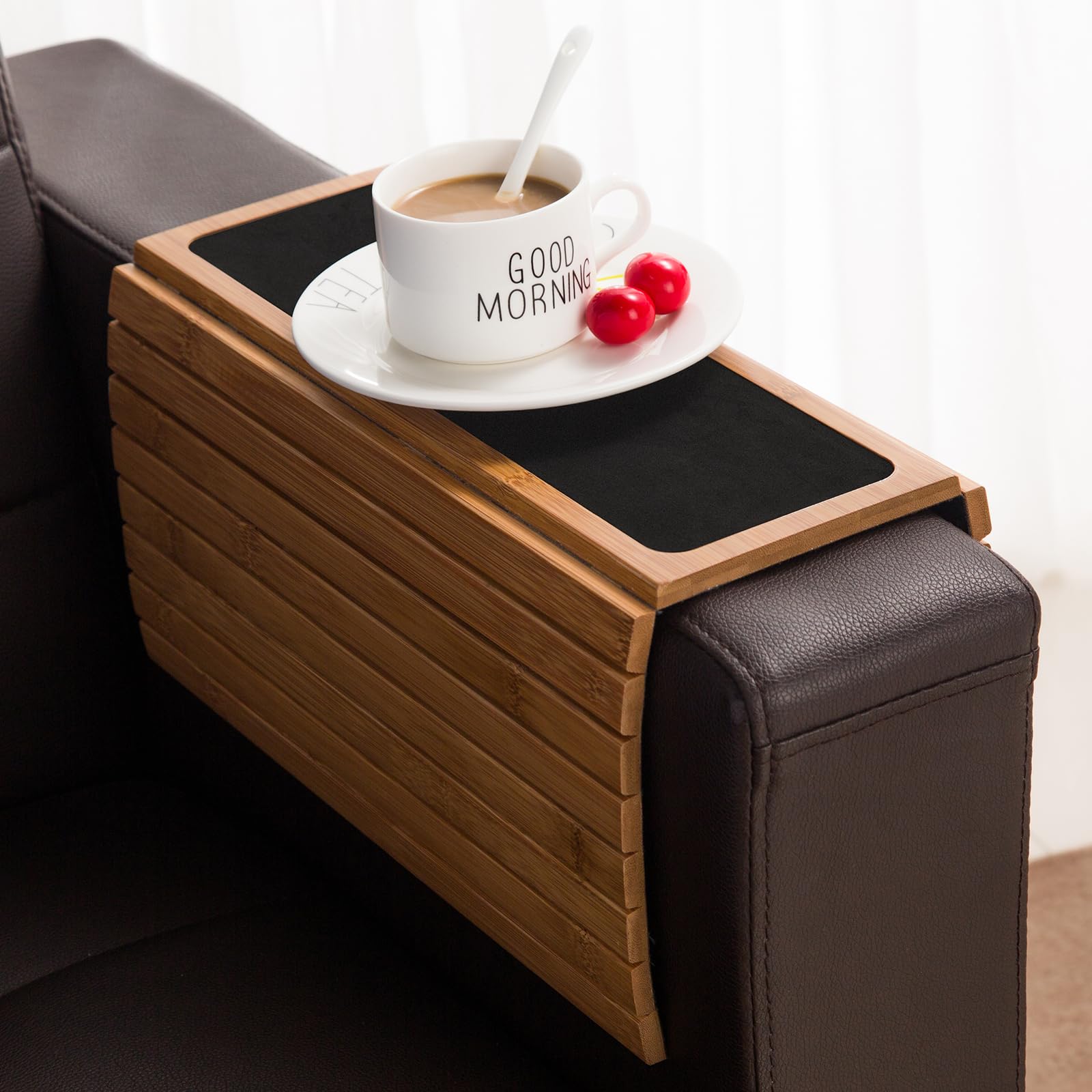 GEHE front view on sofa showing stable surface for drinks and devices