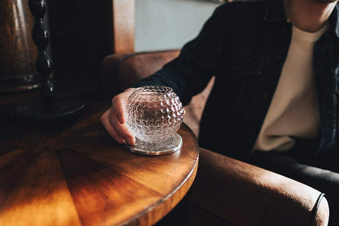 Gemsho Glass filled with whiskey and ice demonstrating drink presentation appeal