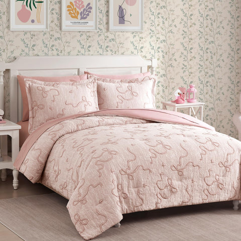 Geniospin sheets and pillow ensemble showing matching shams and pillowcases for a polished look