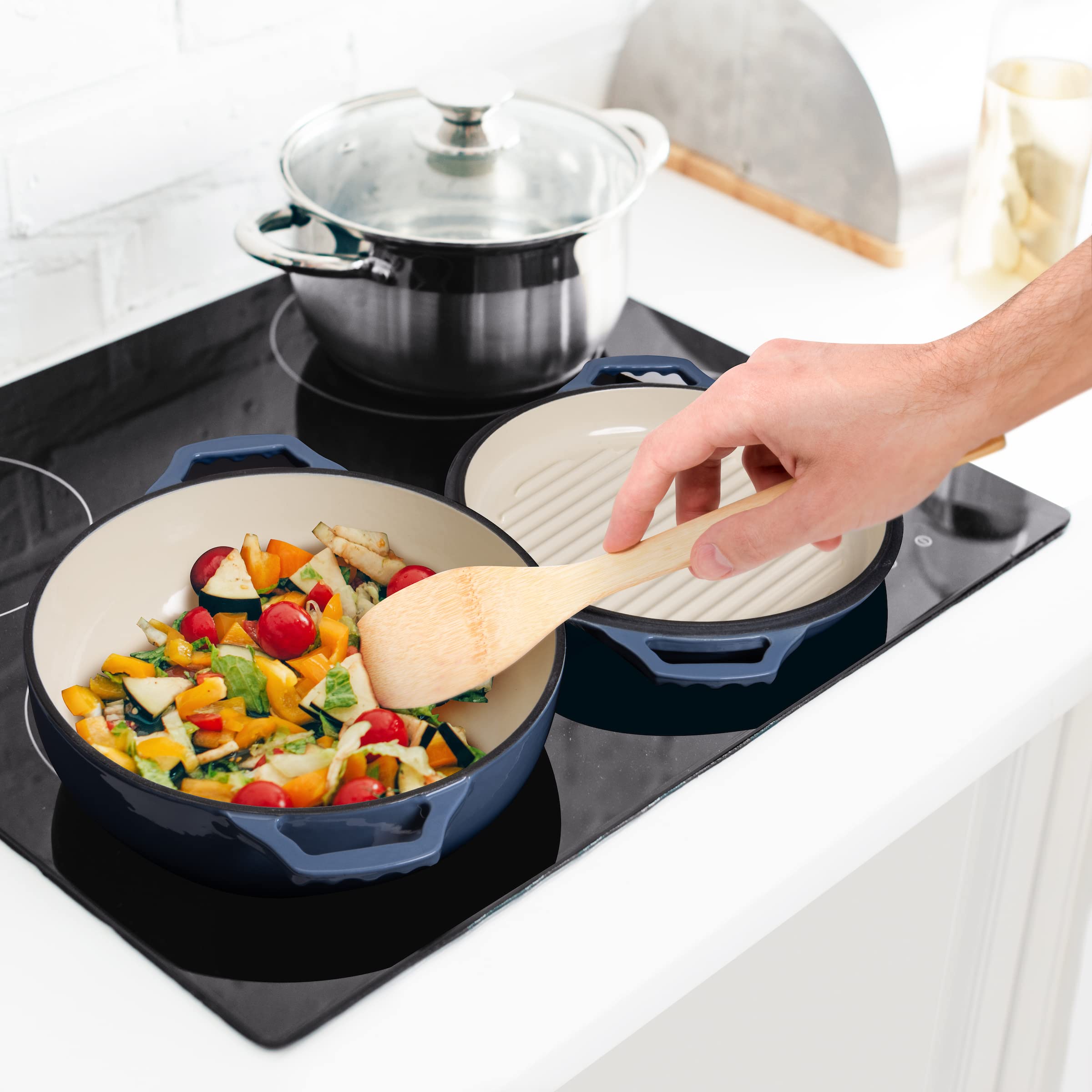 Gennua Kitchen braiser on table served with food, attractive cookware for small gatherings
