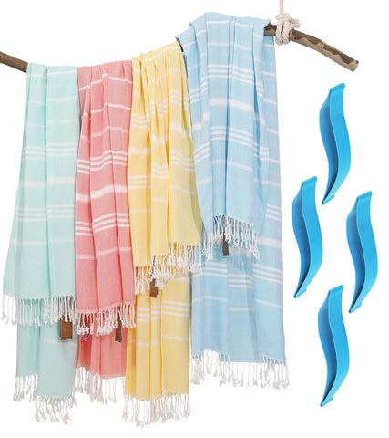 Genovega hand shaking towel to remove sand showing sand-repellent benefit