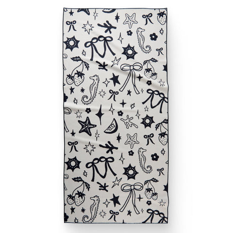 GEOMETRY front view showing Earth and Sea towel vibrant print and portability