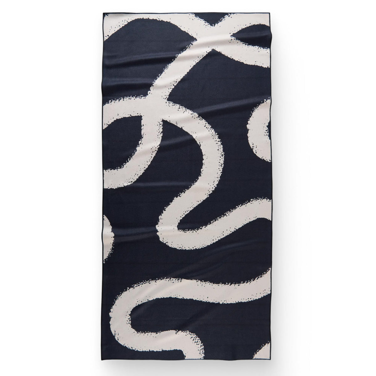 GEOMETRY front view of towel showing vibrant seasonal print and compact design benefit