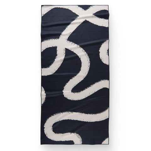 GEOMETRY front view of towel showing vibrant seasonal print and compact design benefit