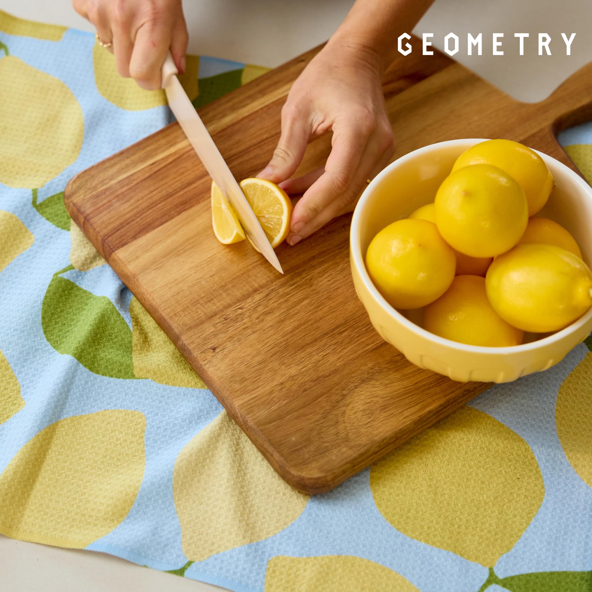 GEOMETRY sewn label noting post-consumer materials and eco-conscious benefit