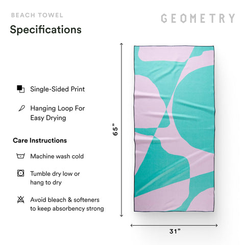 GEOMETRY towel on sand showing sand-resistant weave for easy cleanup