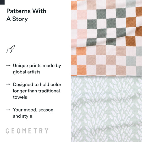 GEOMETRY towel beside a plate for scale, showing generous 18x30 size