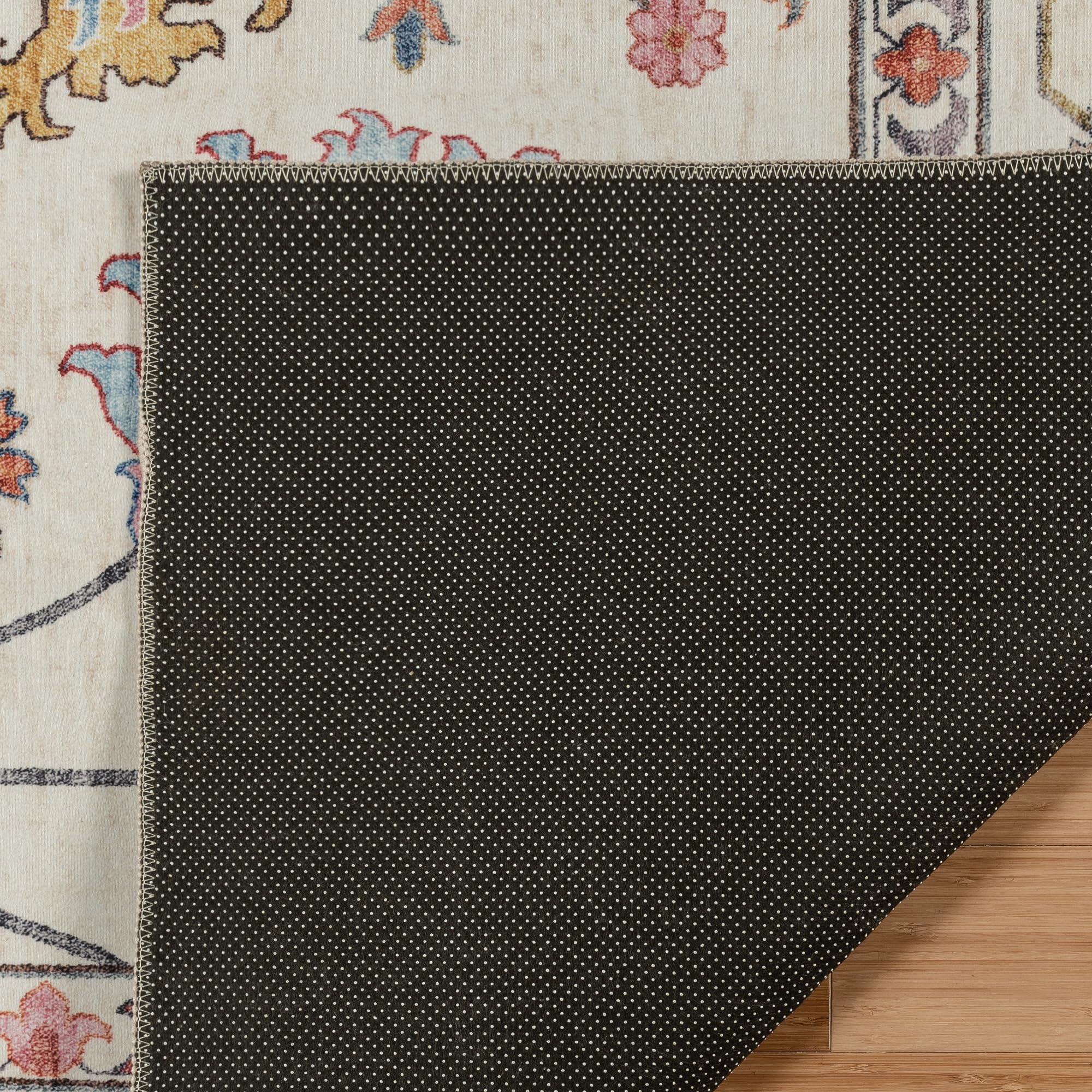 Gertmenian latex backing detail showing non-slip grip for safer placement