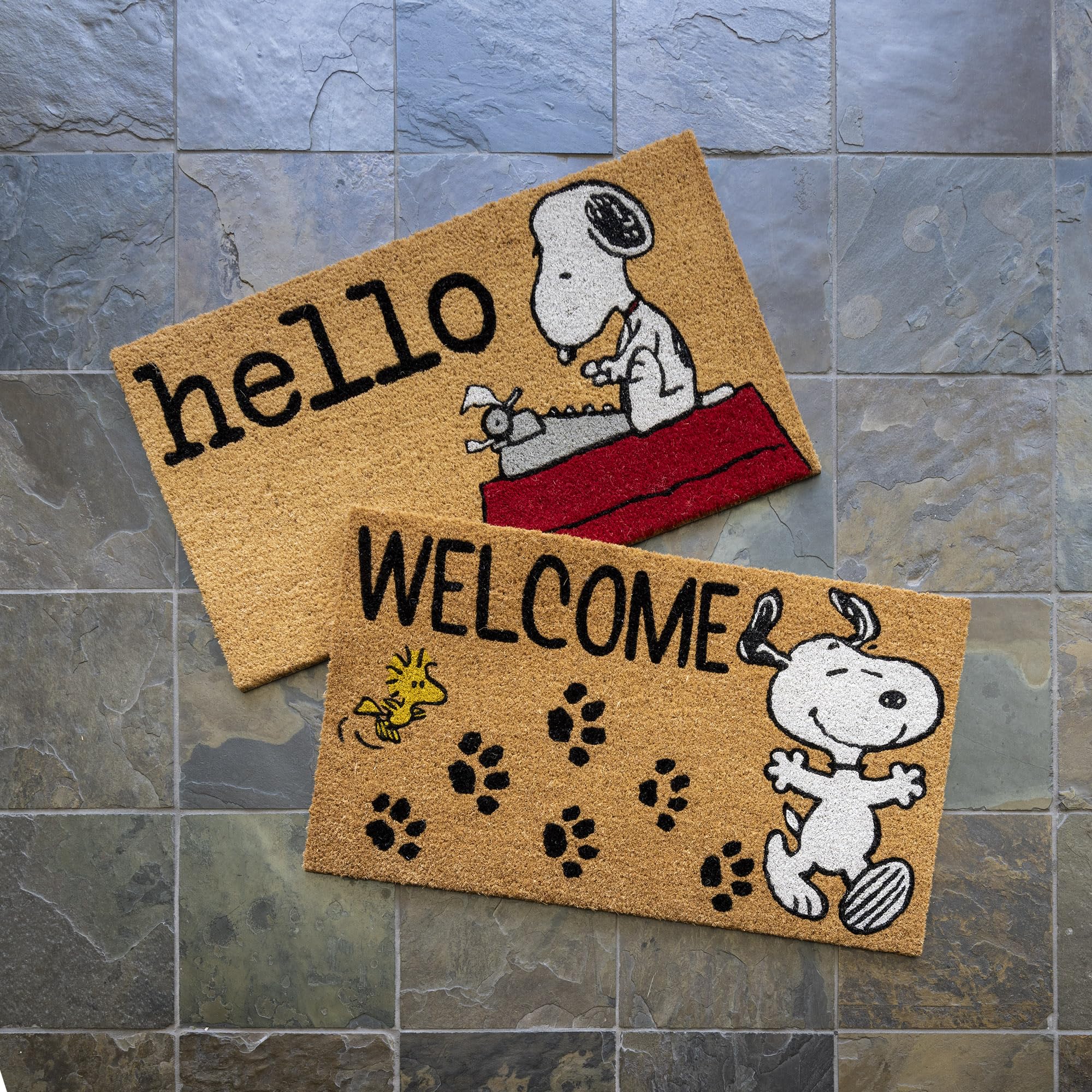 Gertmenian Snoopy mat in use at front door keeping floors cleaner