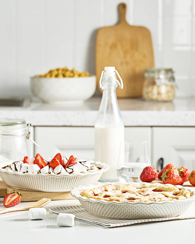 getstar pie pan on rustic table with served pie showing attractive serving convenience