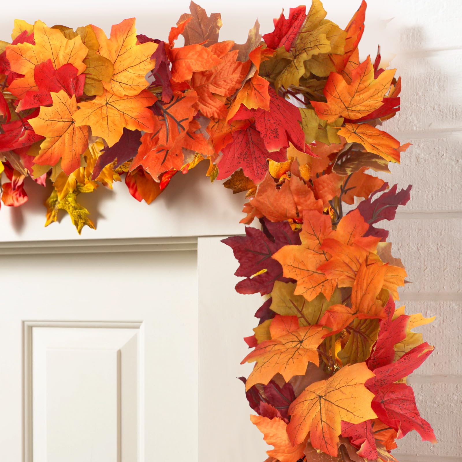 Giaueoa garland used as table centerpiece complementing pumpkins