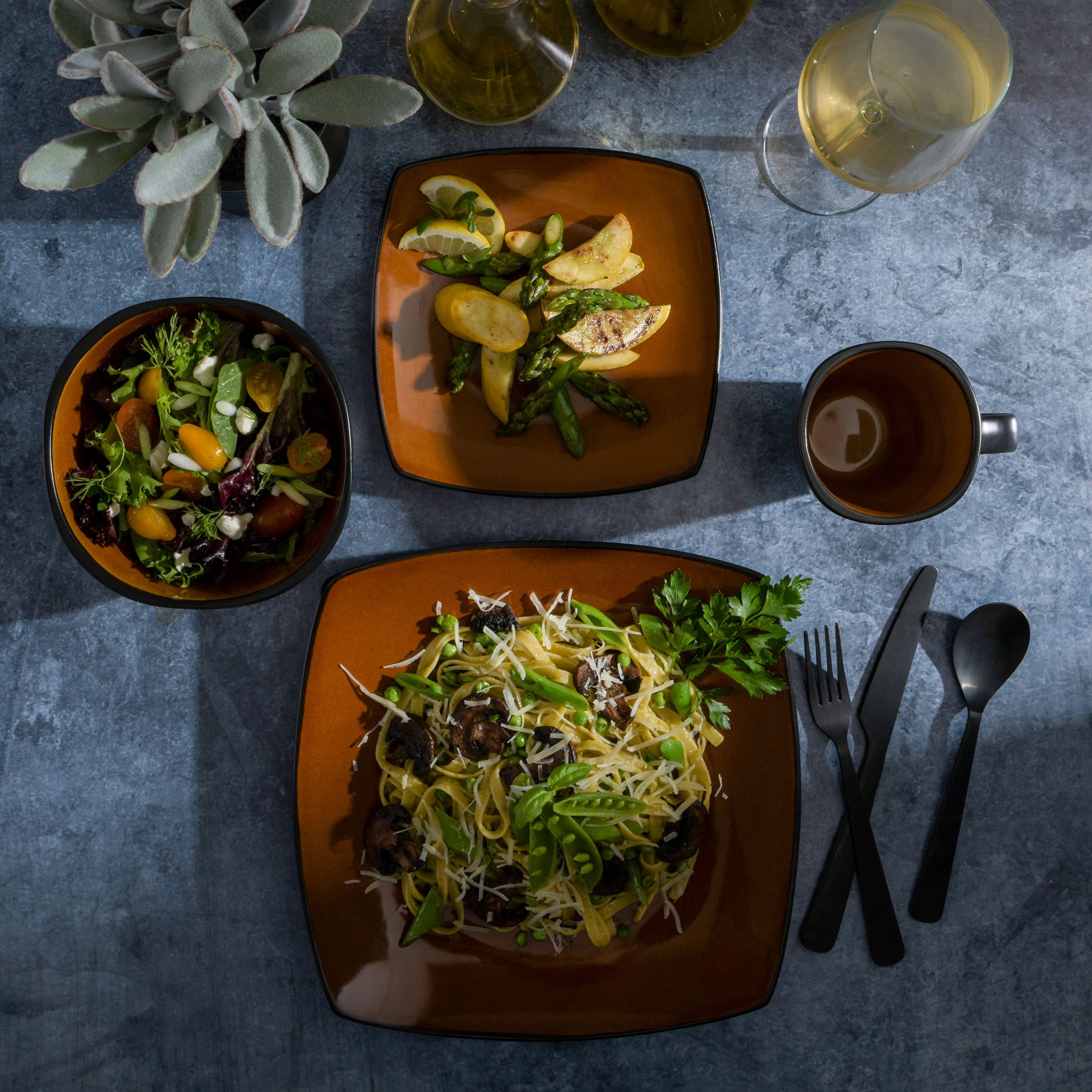 Gibson Elite set beside utensils demonstrating scale and everyday usability
