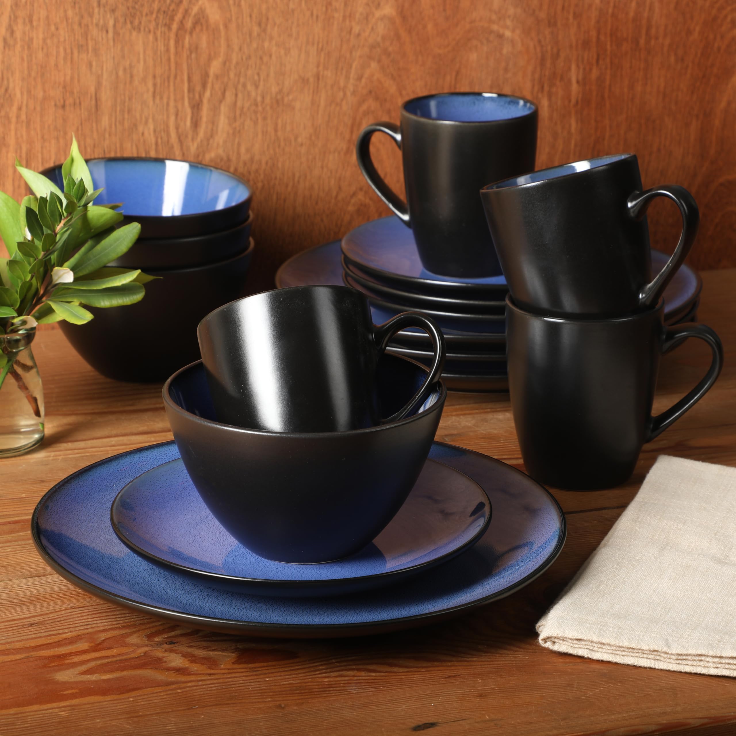 Gibson Elite lifestyle table setting with plates, bowls, and mugs illustrating elegant hosting and mixed-table styling