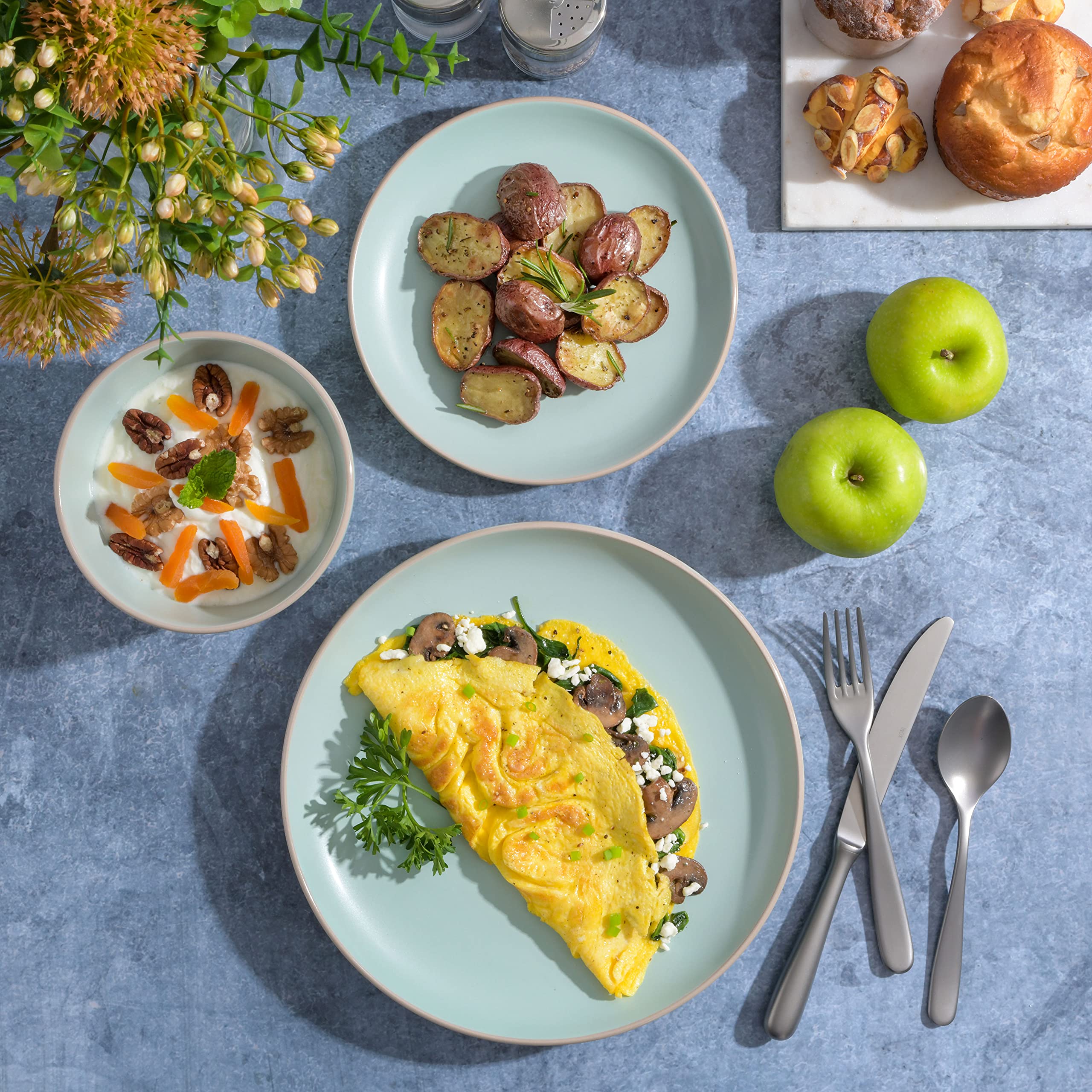 Gibson Home styled table setting with teal dishes demonstrating casual entertaining appeal