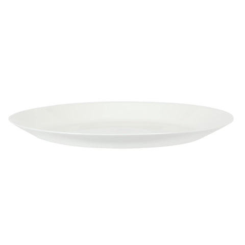 Gibson Home plate beside fork and knife to show 10-inch scale and practical size for family meals