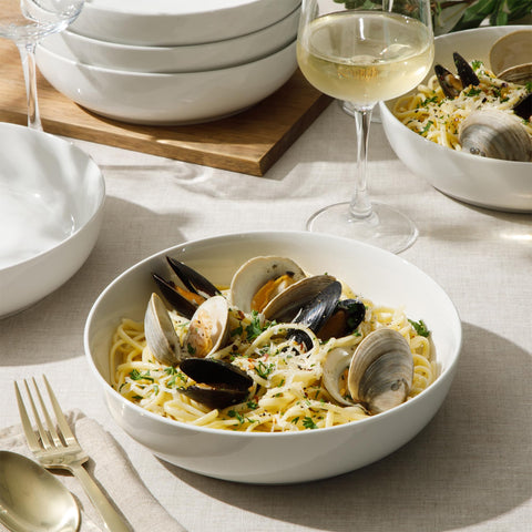 Gibson Home table setting with bowls showcasing coordinated dinner styling and versatility