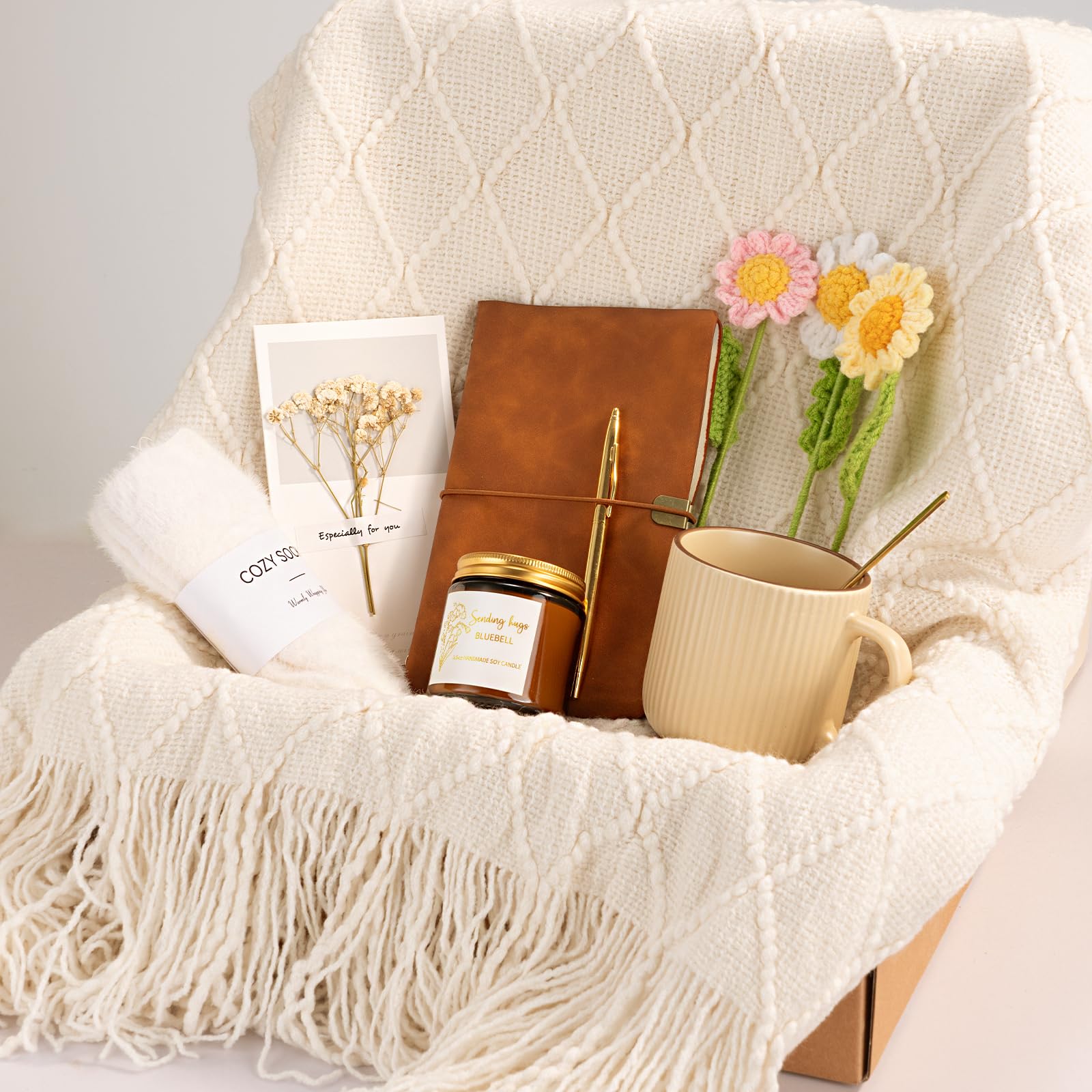 Giftissimo beige ceramic mug with gold spoon highlighting elegant sipping and relaxation