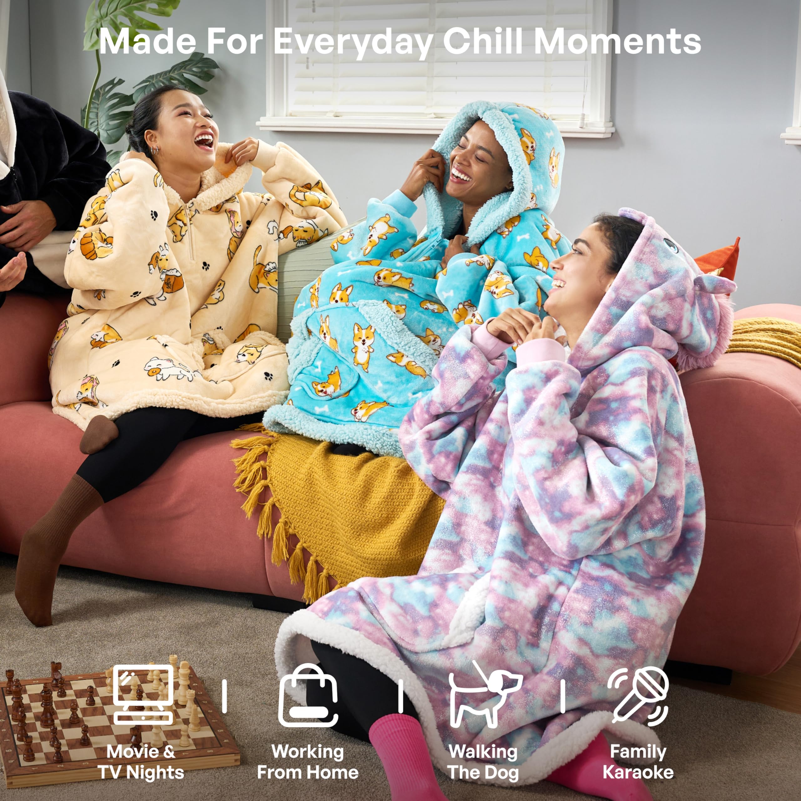 Giggling Getup model wearing hoodie blanket in living room suggesting relaxed lifestyle comfort