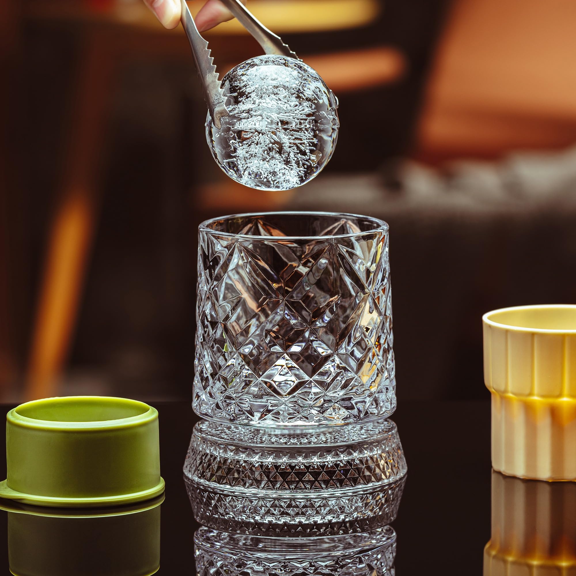 Ginireto ice sphere in glass demonstrating slow-melt cooling for longer chill