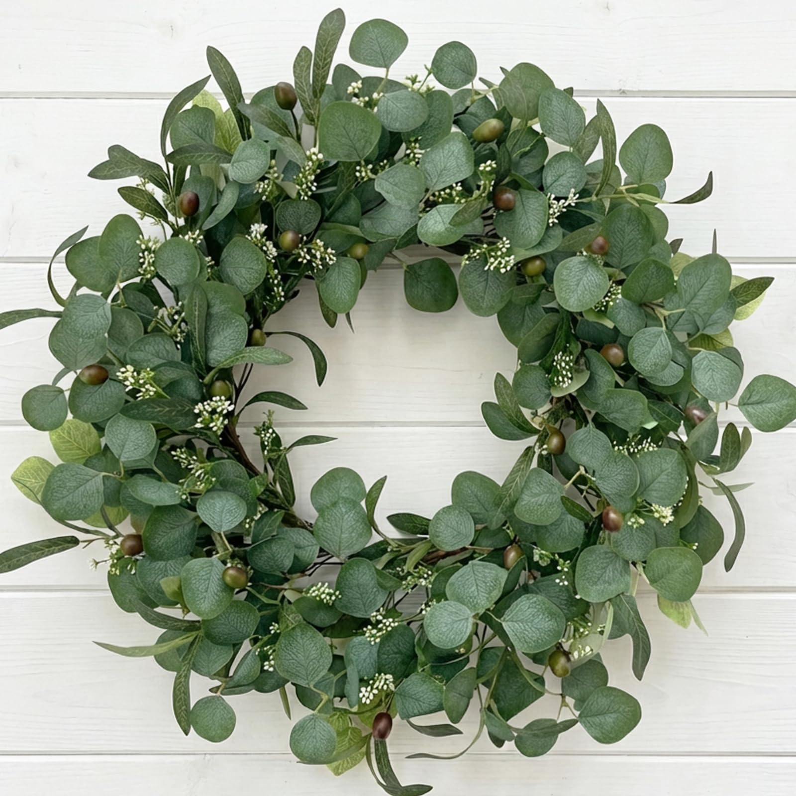 GinzeTop wreath on front door offering instant curb appeal
