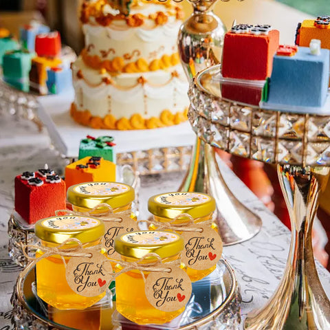 GIVAMEIHF jars arranged on table as wedding favors showing polished event presentation