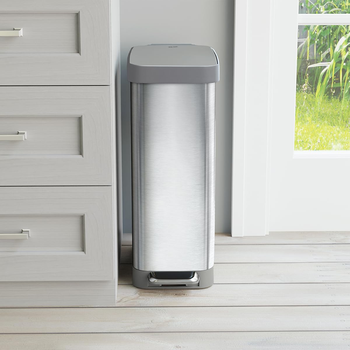 Glad slim trash can internal roll holder storing spare bags for quick change