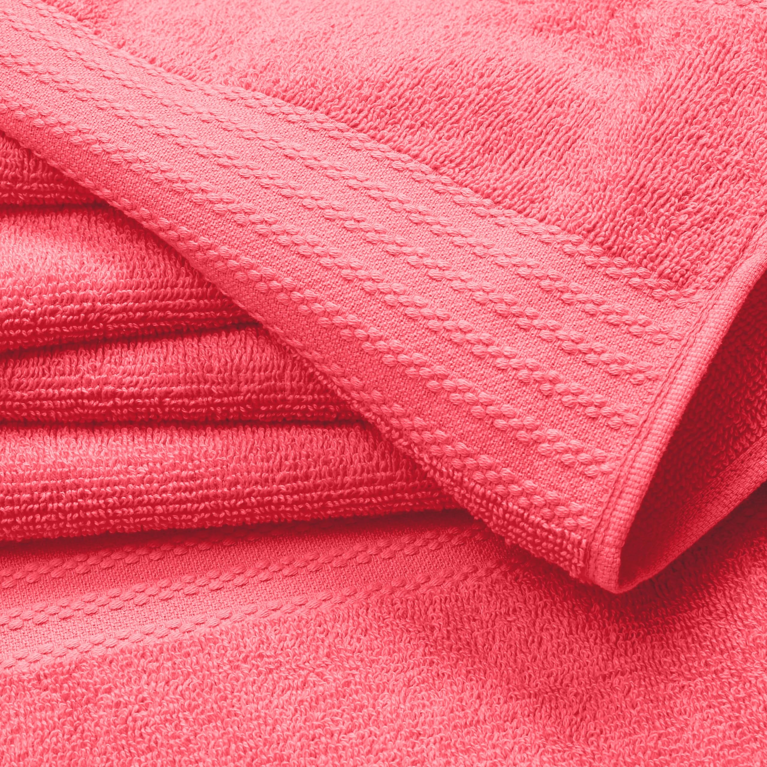 GLAMBURG single bath towel spread flat illustrating generous oversized coverage