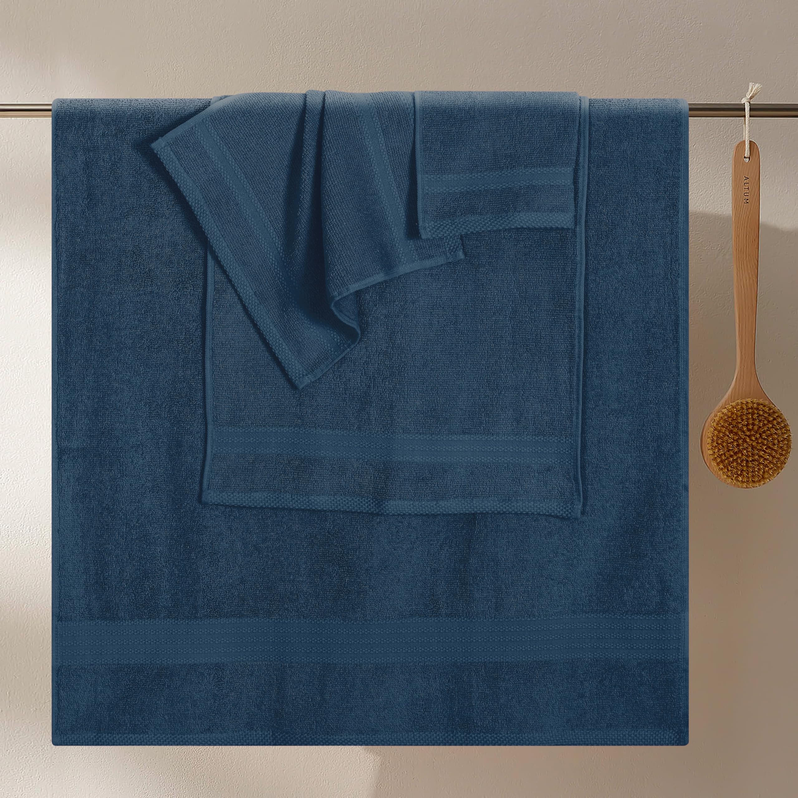 GLAMBURG stacked hand towel and washcloth illustrating compact storage and quick access