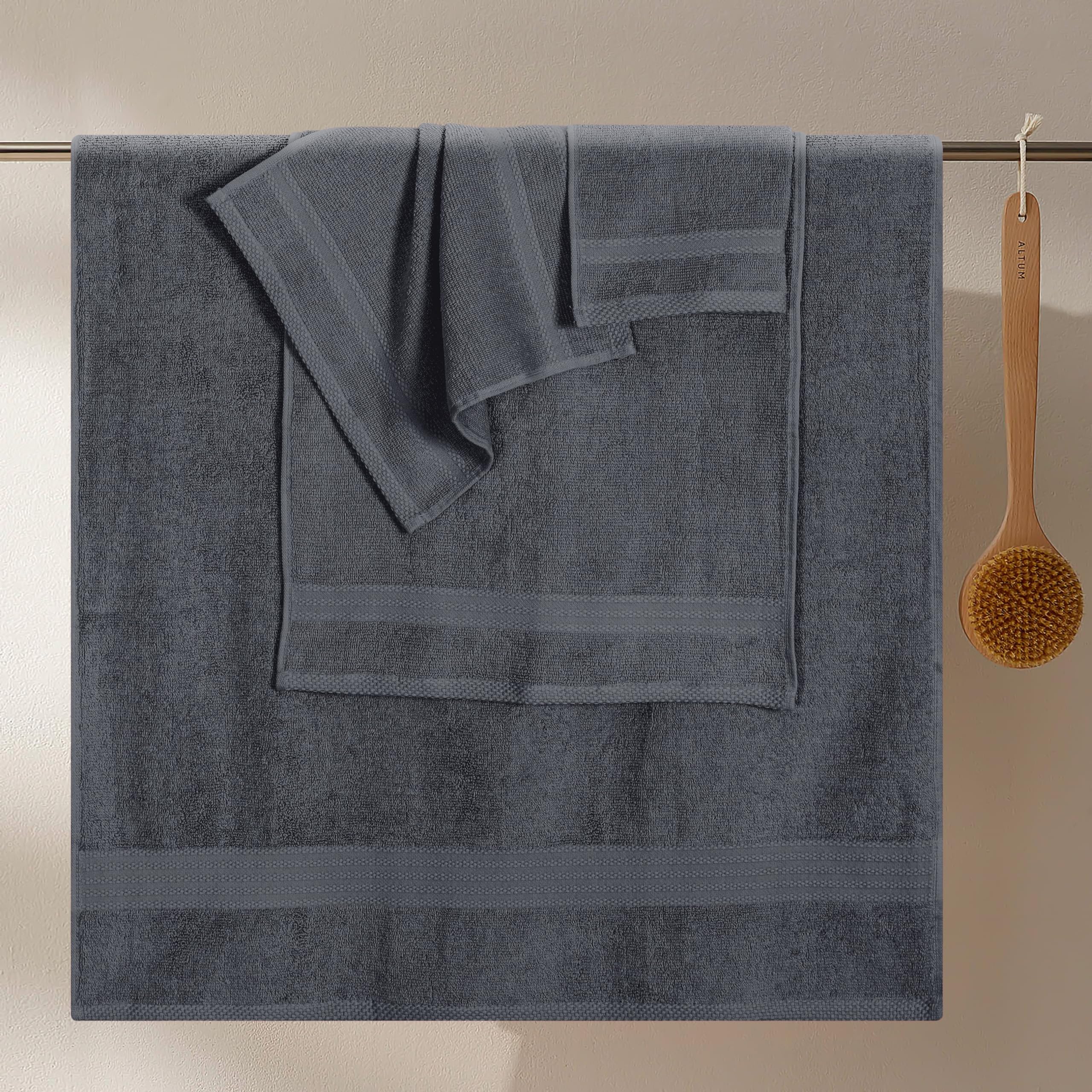 GLAMBURG neatly stacked hand towels demonstrating tidy storage and quick-access benefit