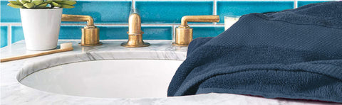 GLAMBURG stitched hem and care label detail indicating durable construction