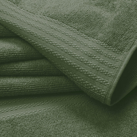 GLAMBURG close-up of oversized olive bath towel pile highlighting absorbent ring-spun cotton softness