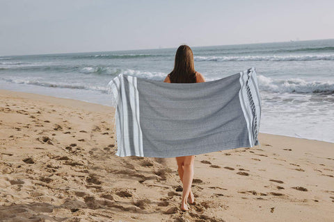 GLAMBURG worn as sarong to show versatile wrap-around beach use