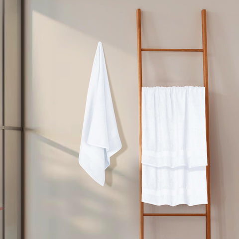 GLAMBURG towel on bathroom floor showing 27x54 inch size and coverage