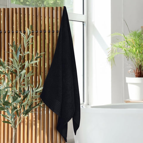 GLAMBURG towel packed in gym bag demonstrates portability and quick-dry benefit