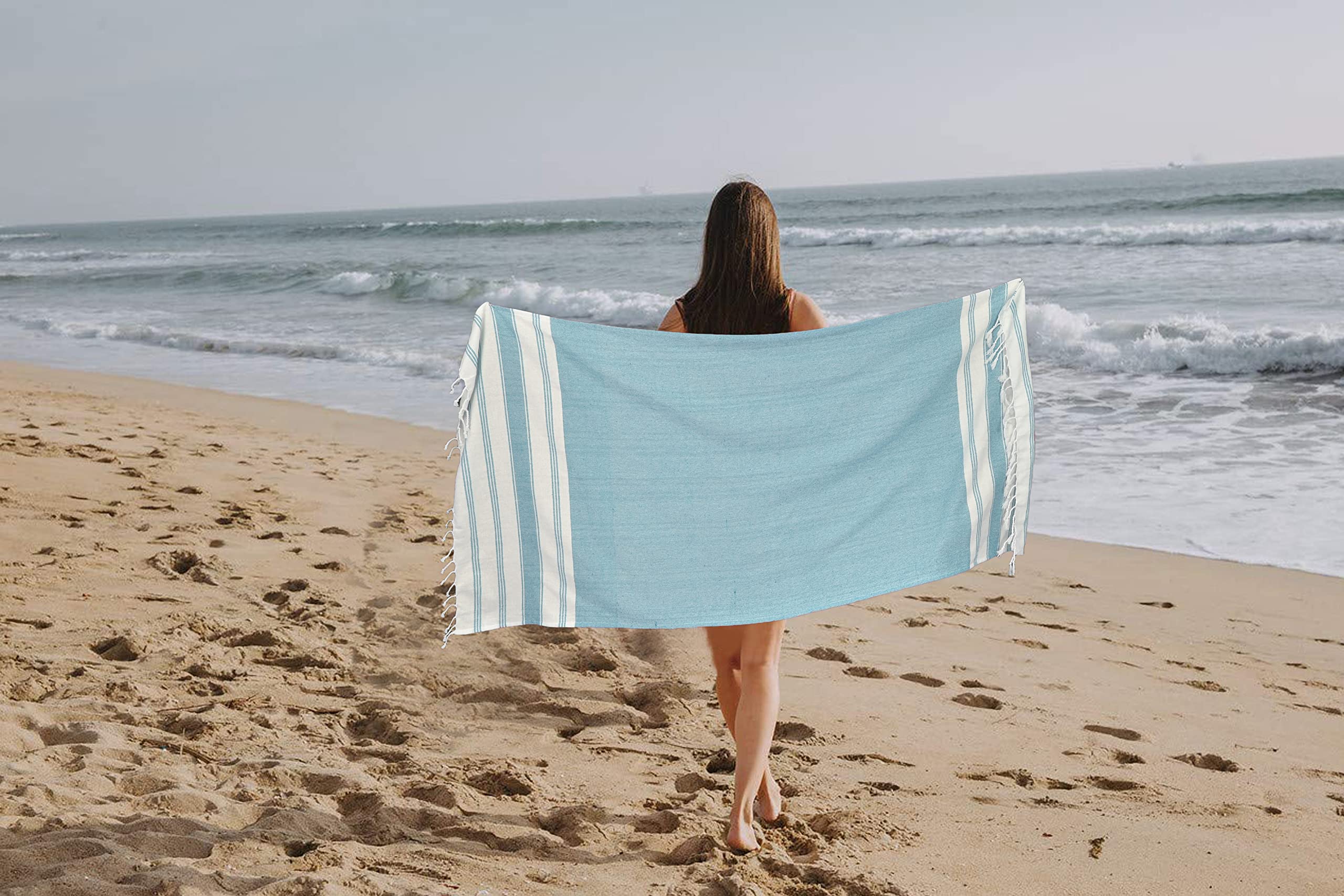 GLAMBURG towel wrapped as sarong demonstrating versatile wear and coverage benefit