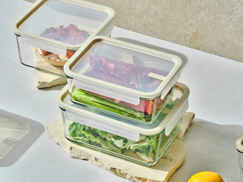 Glasslock containers next to an apple showing scale for portioning