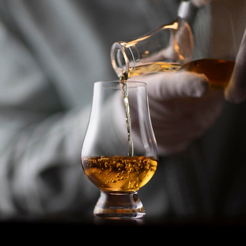 GLENCAIRN glass poured with scotch illustrating aroma capture and tasting focus