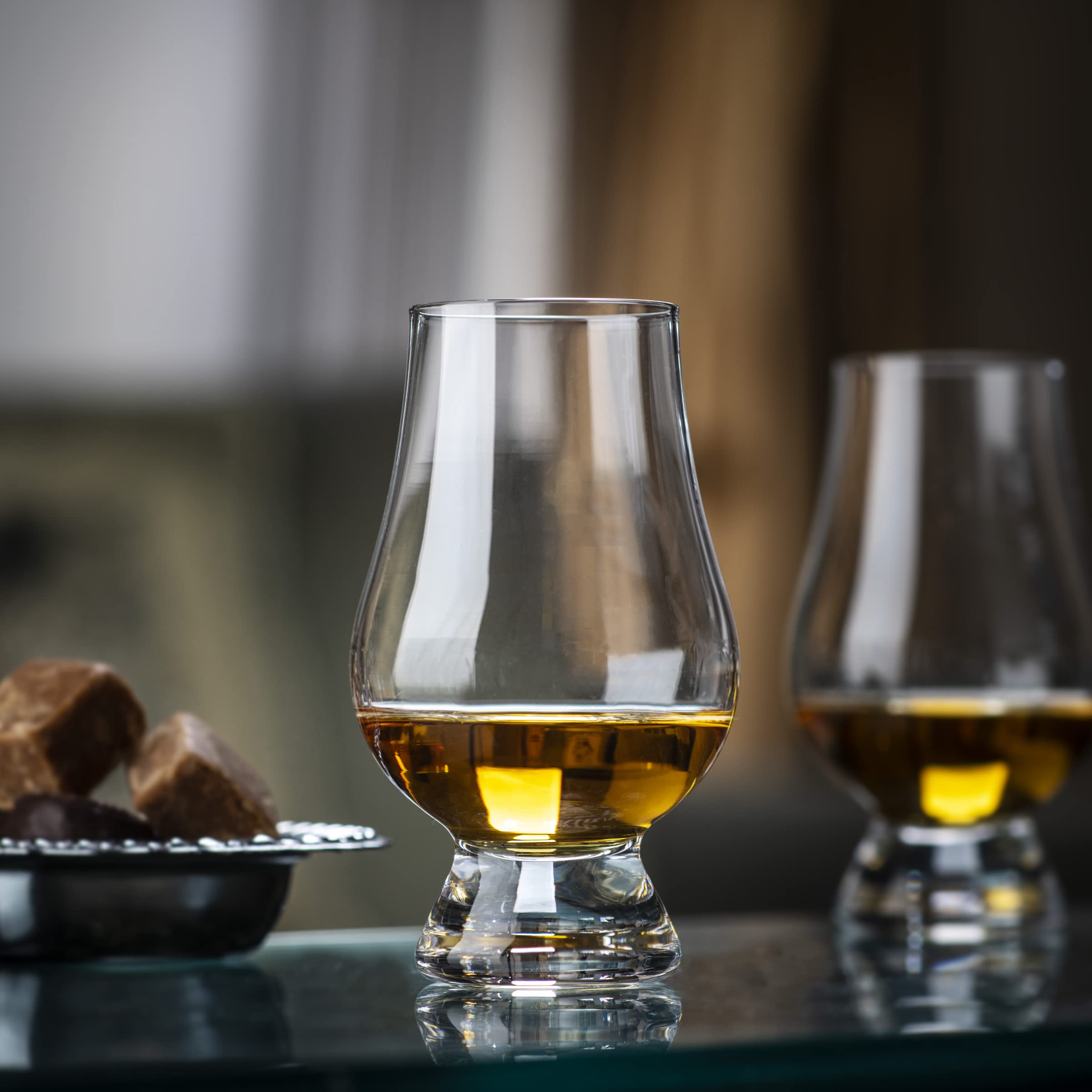 GLENCAIRN glasses on dinner table in lifestyle scene enhancing host presentation