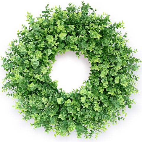 GLIDLION wreath on front door adds welcoming green curb appeal